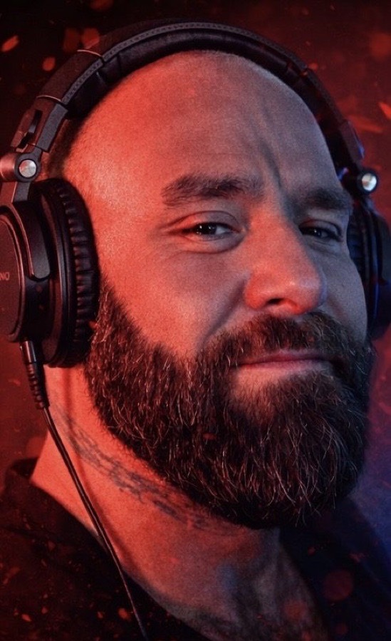 Phil Gizzie wearing headphones